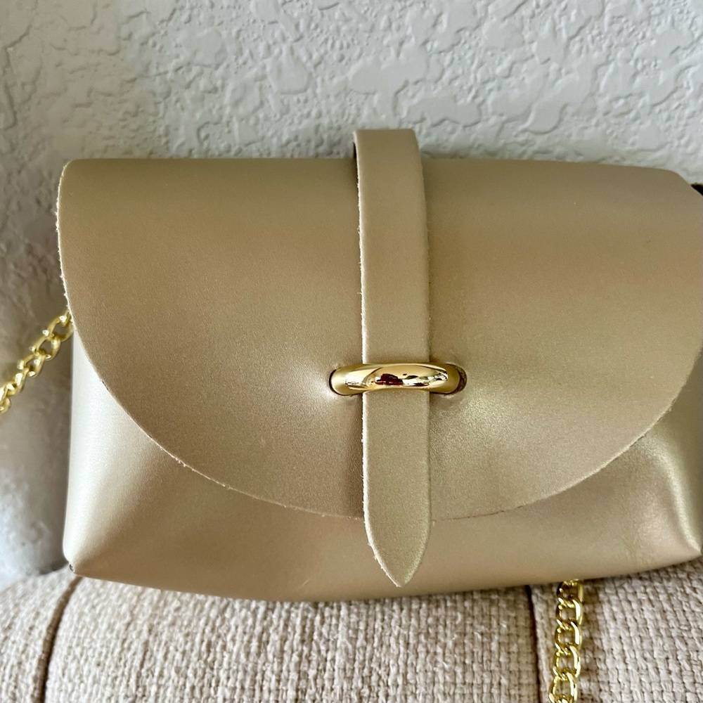 Darling little gold evening bag from Taormina!  Perfect for your night out.